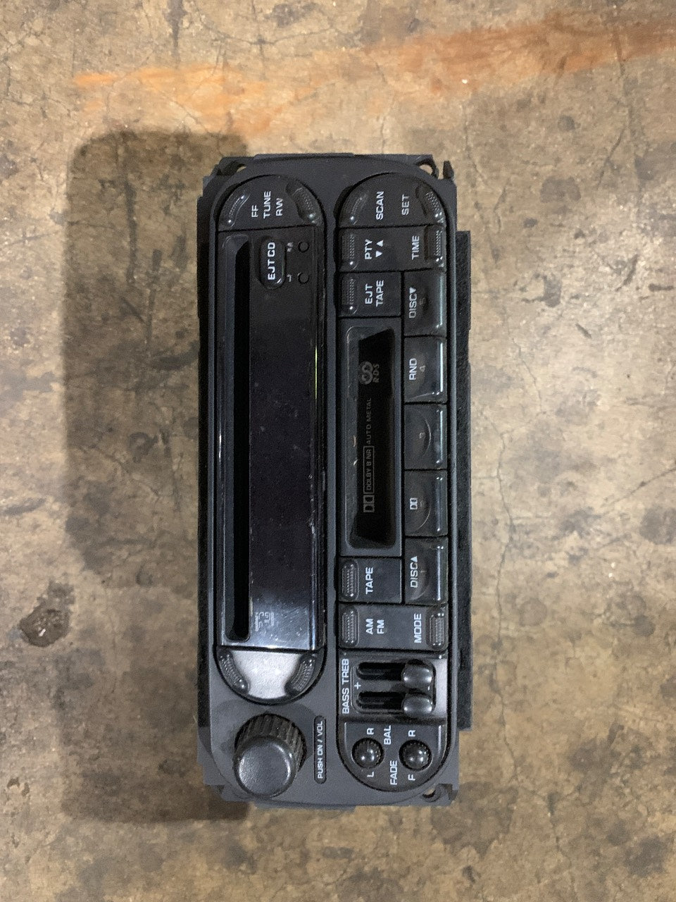 Chrysler P05091605AC OEM AM/FM/CD/Cassette Radio Receiver - Used