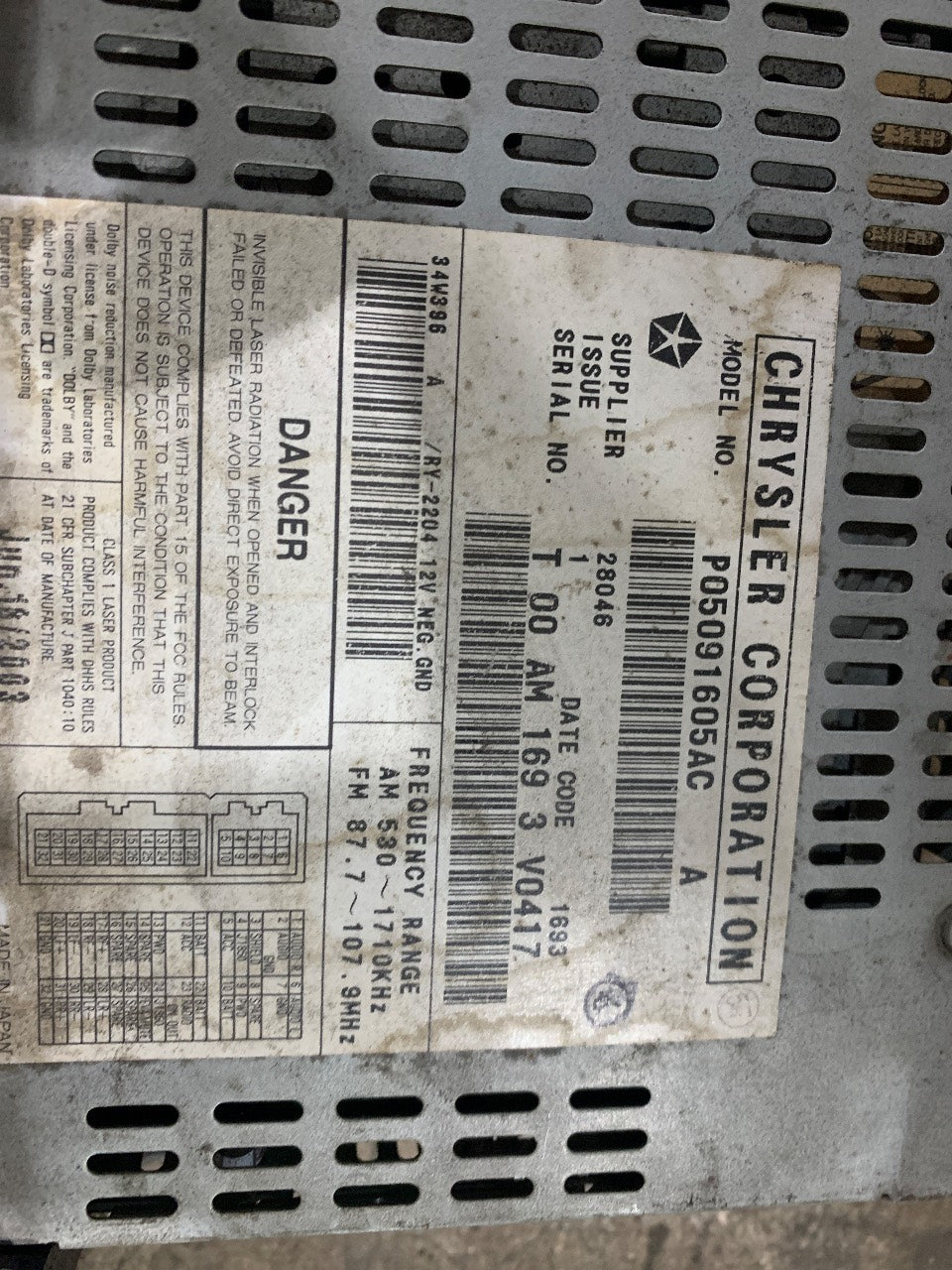 Chrysler P05091605AC OEM AM/FM/CD/Cassette Radio Receiver - Used