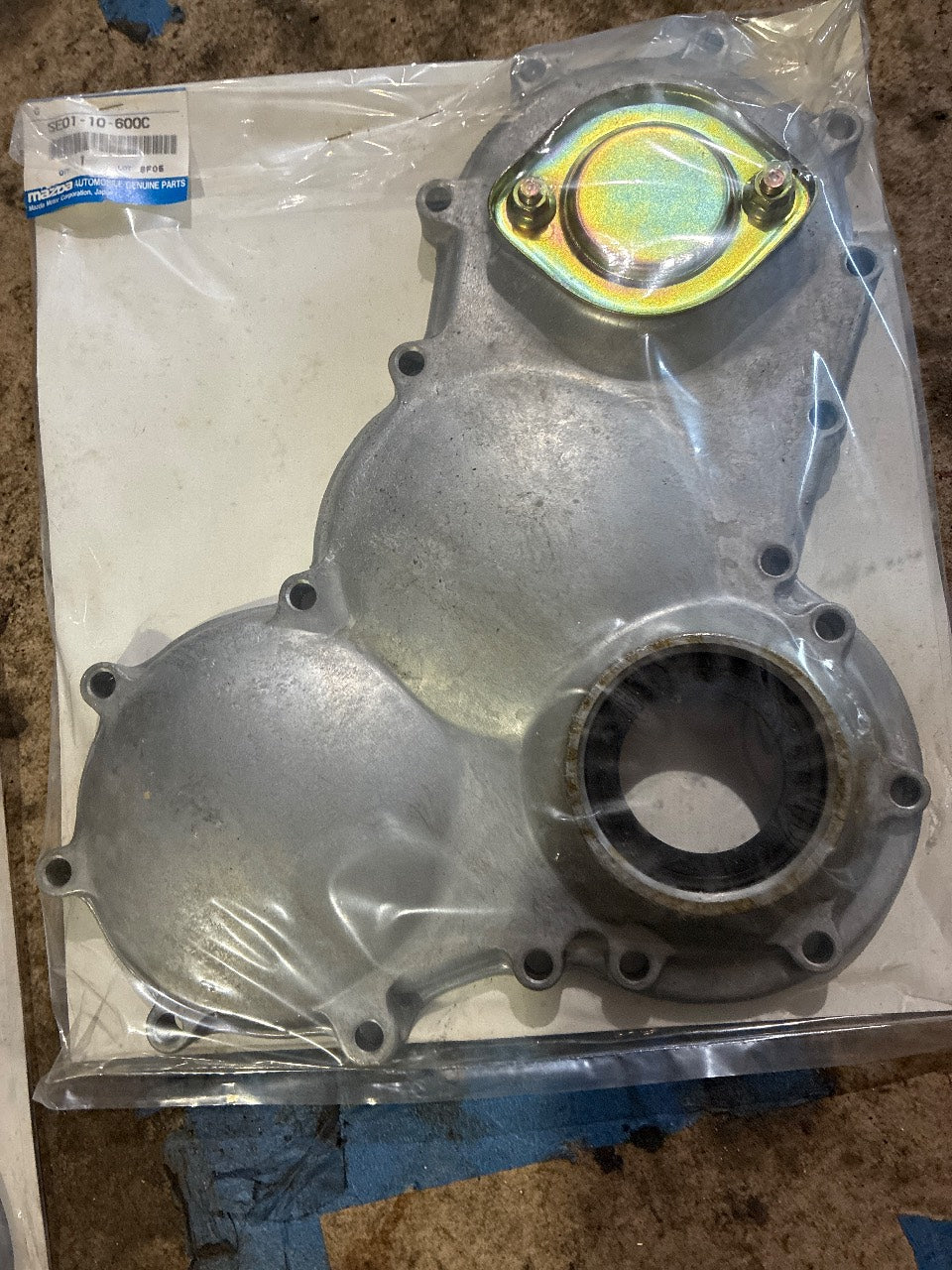 Mazda SE01-10-600C Timing Gear Cover - New OEM