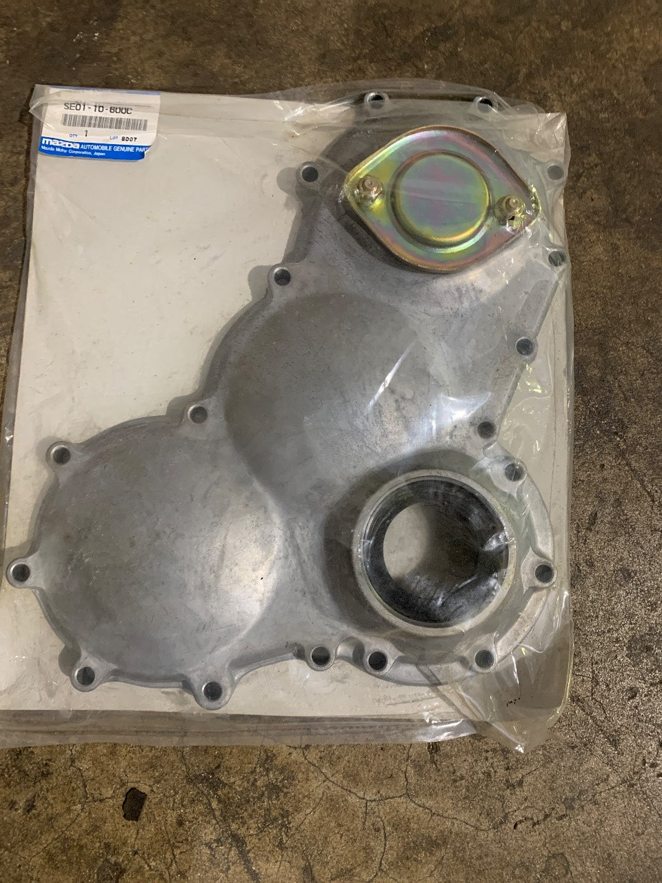 Mazda SE01-10-600C Timing Gear Case Cover - New